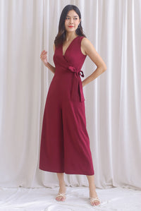 Ivy Faux Wrap Tie Jumpsuit In Wine Red