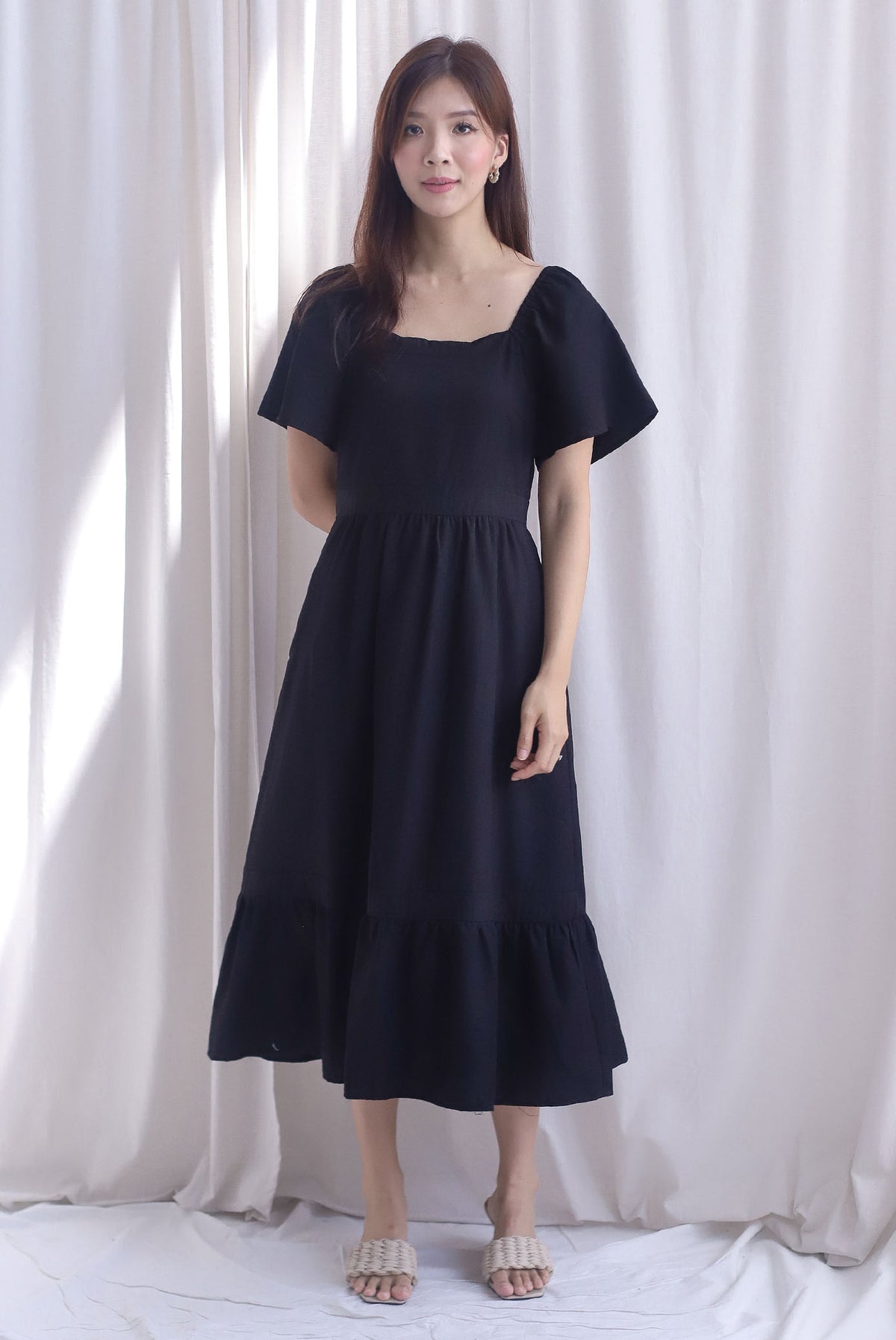Amari Flutter Sleeves Midi Dress In Black