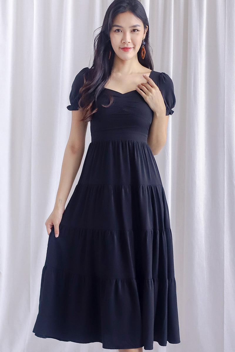 Angelina Puffy Sleeved Tiered Maxi Dress In Black