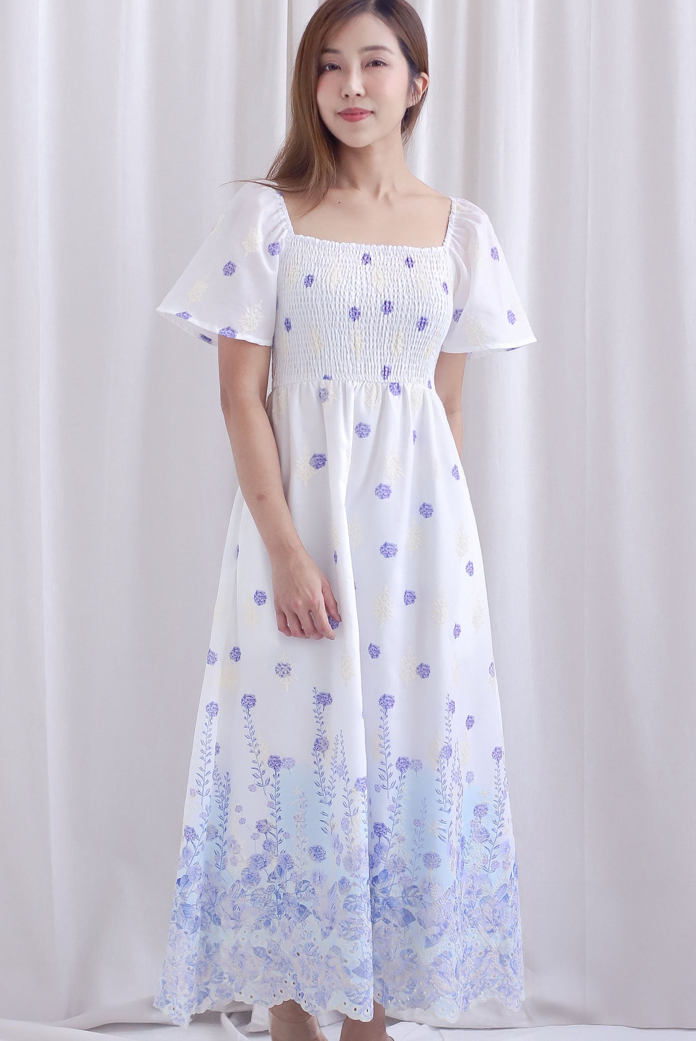 Ariel Watercolour Embro Smocked Maxi Dress In Blue