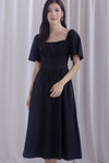 Beryl Ruched Empire Waist Sleeved Dress In Black