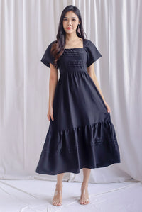 Bevelia Flutter Sleeve Pleated Maxi Dress In Black