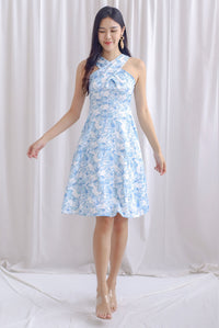 Carin Cross Overlap Midi Dress In Blue Floral