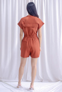 Carl Zip Up Utility Romper In Rust