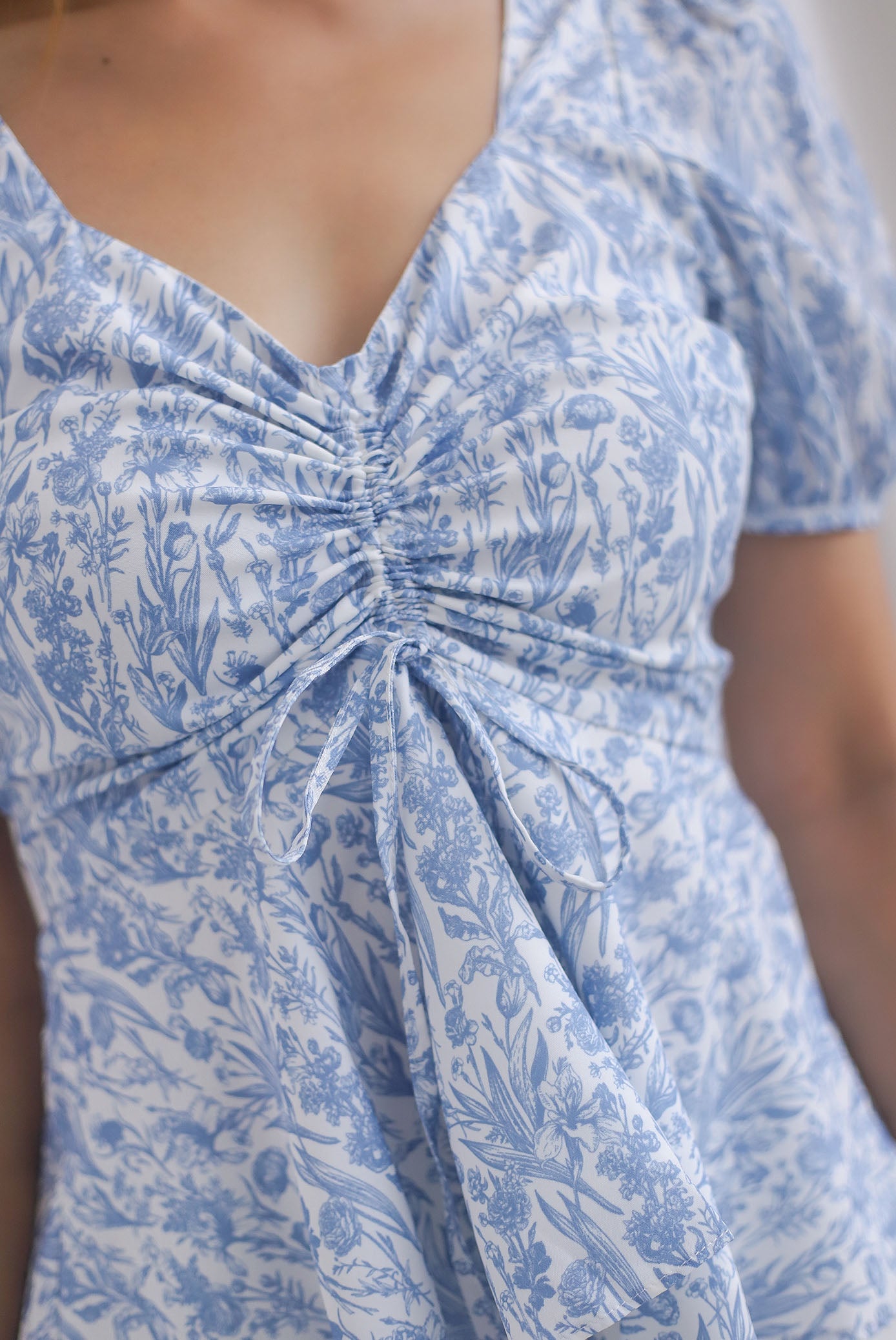 [BY TDC LABEL] Cheri Ruching Peplum Top In Blue Floral