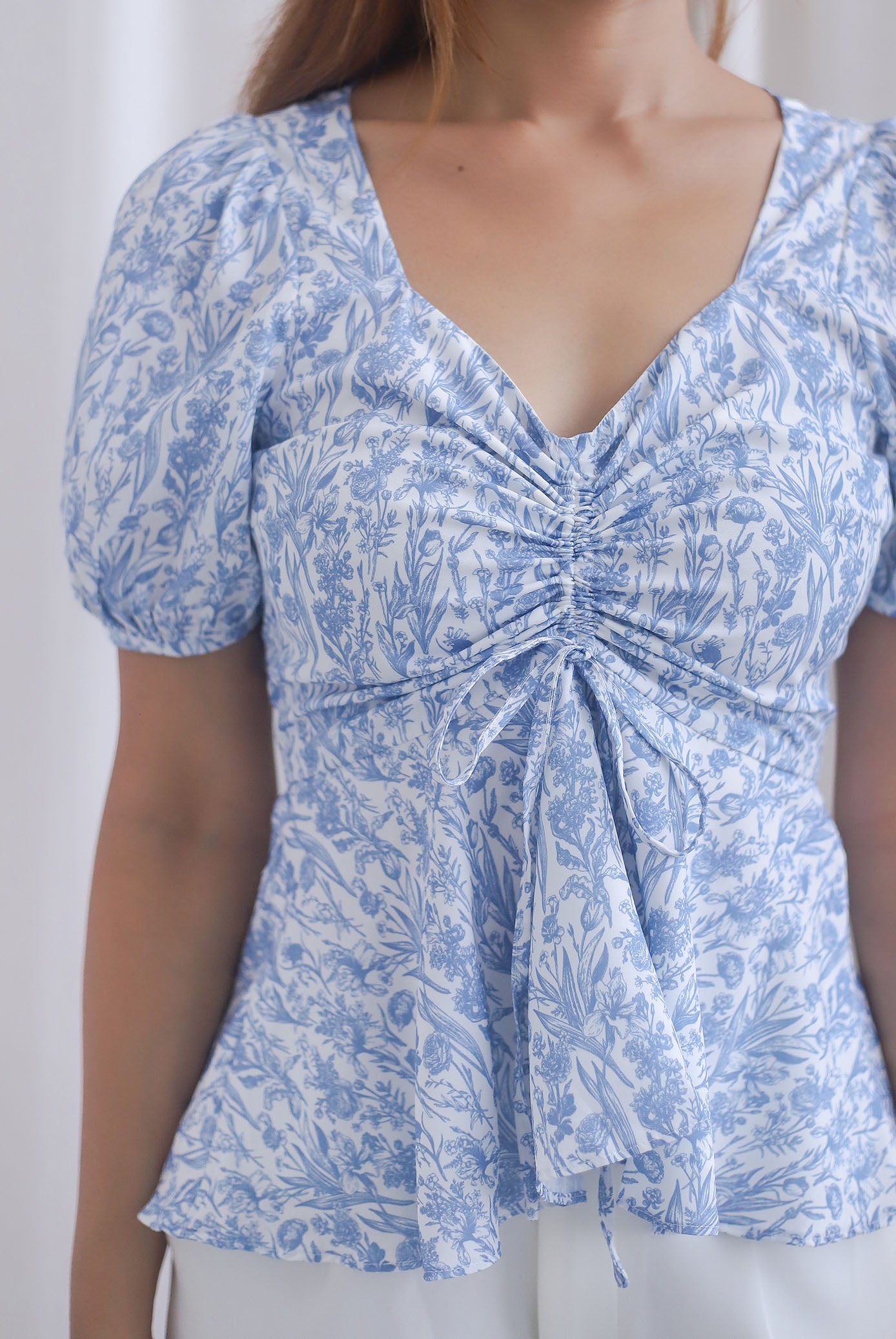 [BY TDC LABEL] Cheri Ruching Peplum Top In Blue Floral
