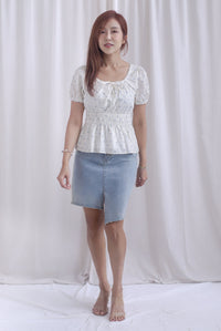 Crystal Floral Tie Ribbon Peplum Top In Blue Swiss Dot