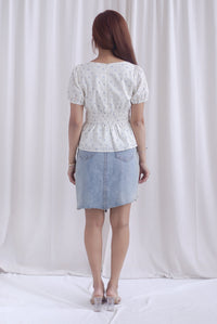 Crystal Floral Tie Ribbon Peplum Top In Blue Swiss Dot