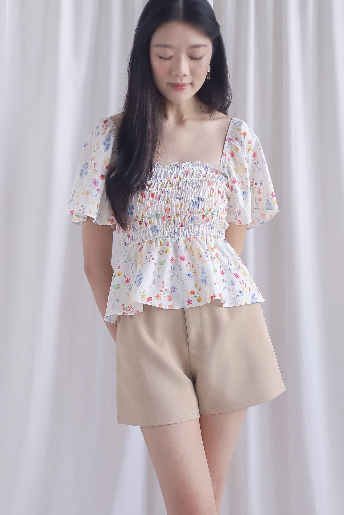 Dorothy Multi Way Smocked Top In Peach Floral