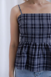 Elly Plaids Spag Peplum Top In Black