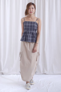 Elly Plaids Spag Peplum Top In Black