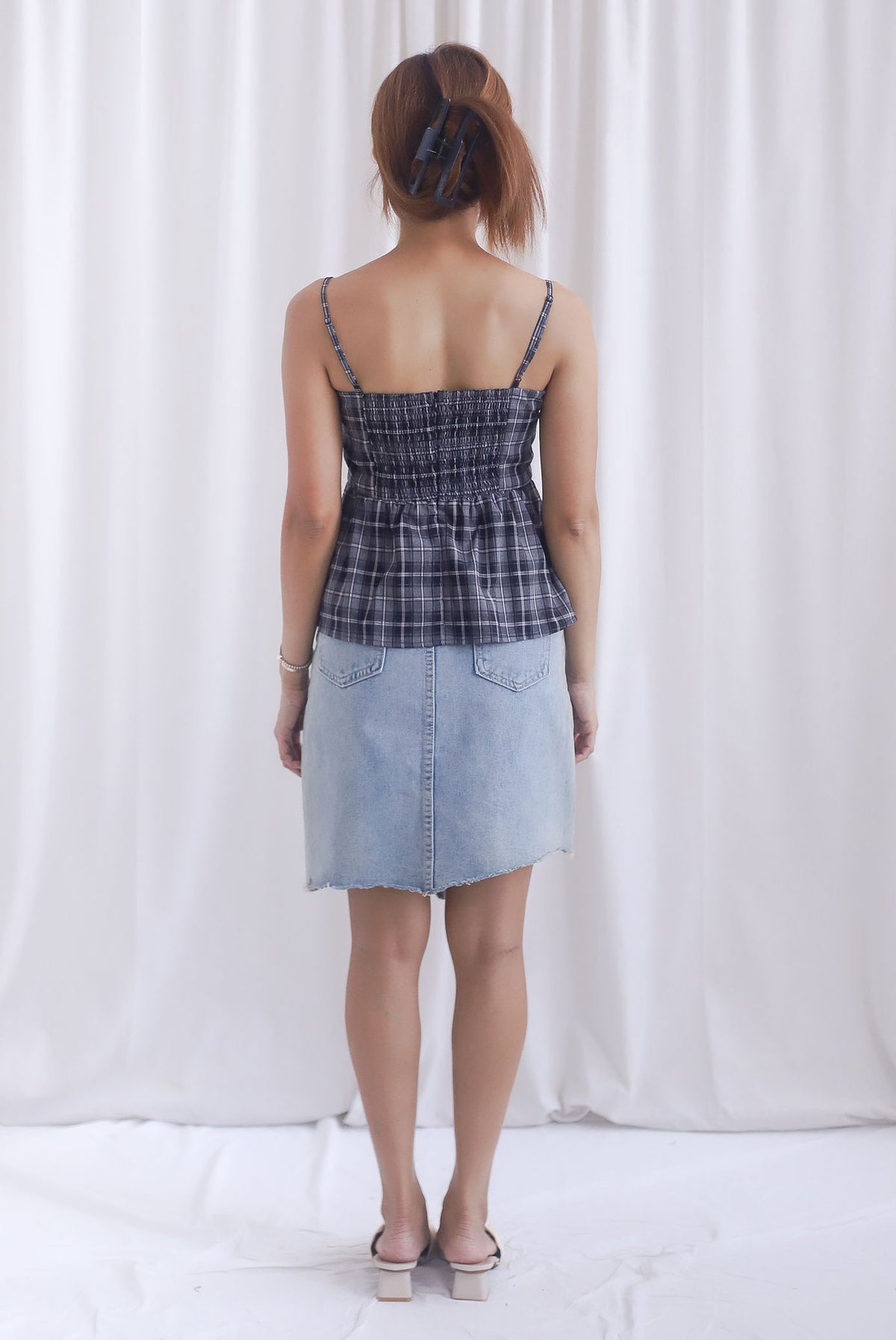 Elly Plaids Spag Peplum Top In Black