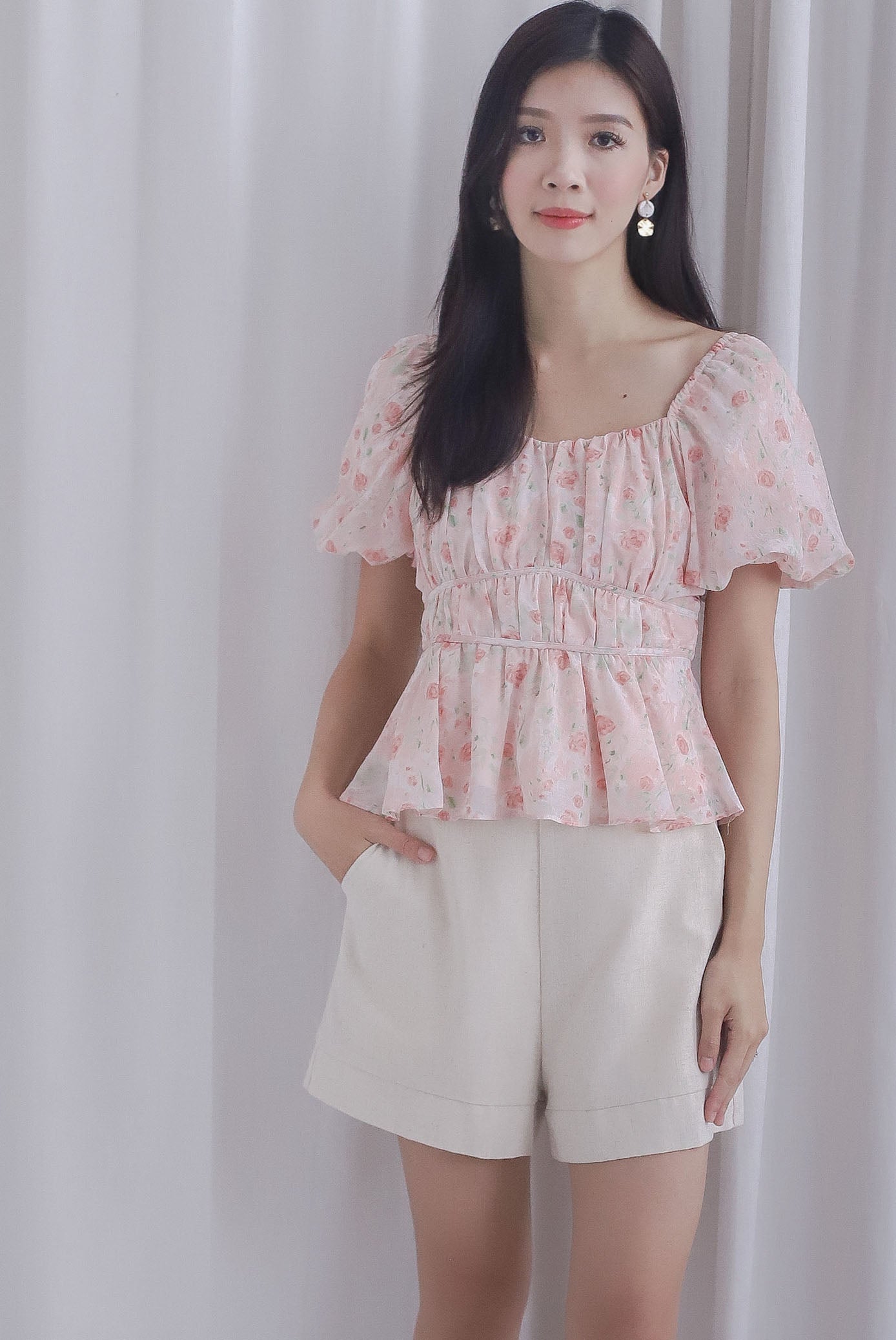 Felipe Floral Puffy Sleeves Ruched Peplum Top In Pink