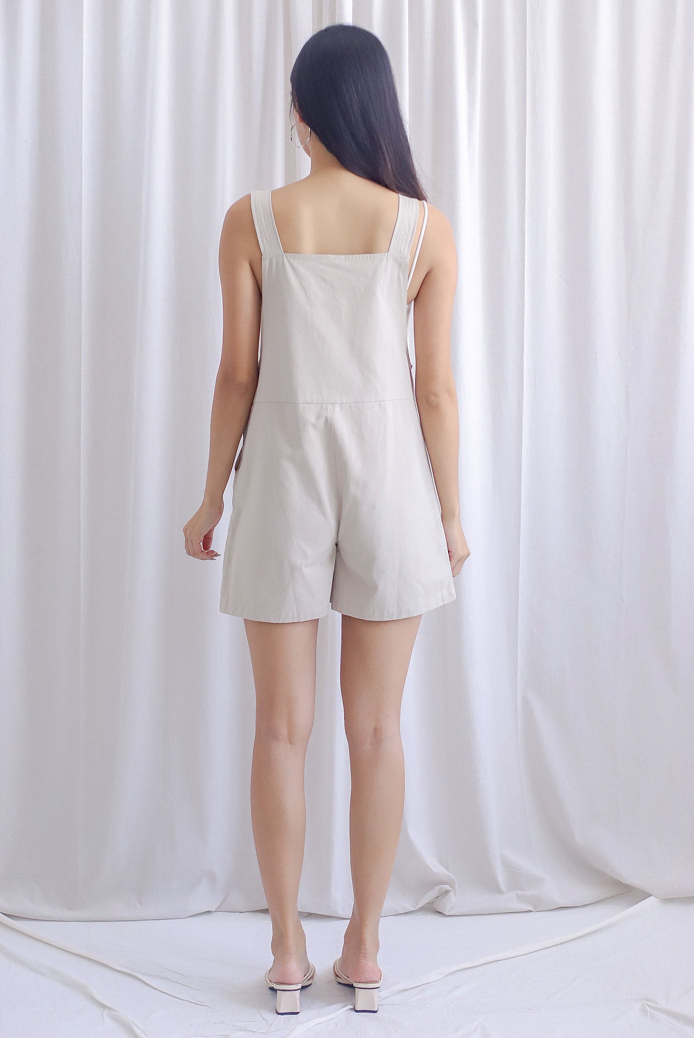 Floy Dungaree Romper In Cream The Design Closets Floy Dungaree Romper In Cream The Design Closets