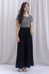Jevon Wide Legged Pleated Palazzo Pants In Black