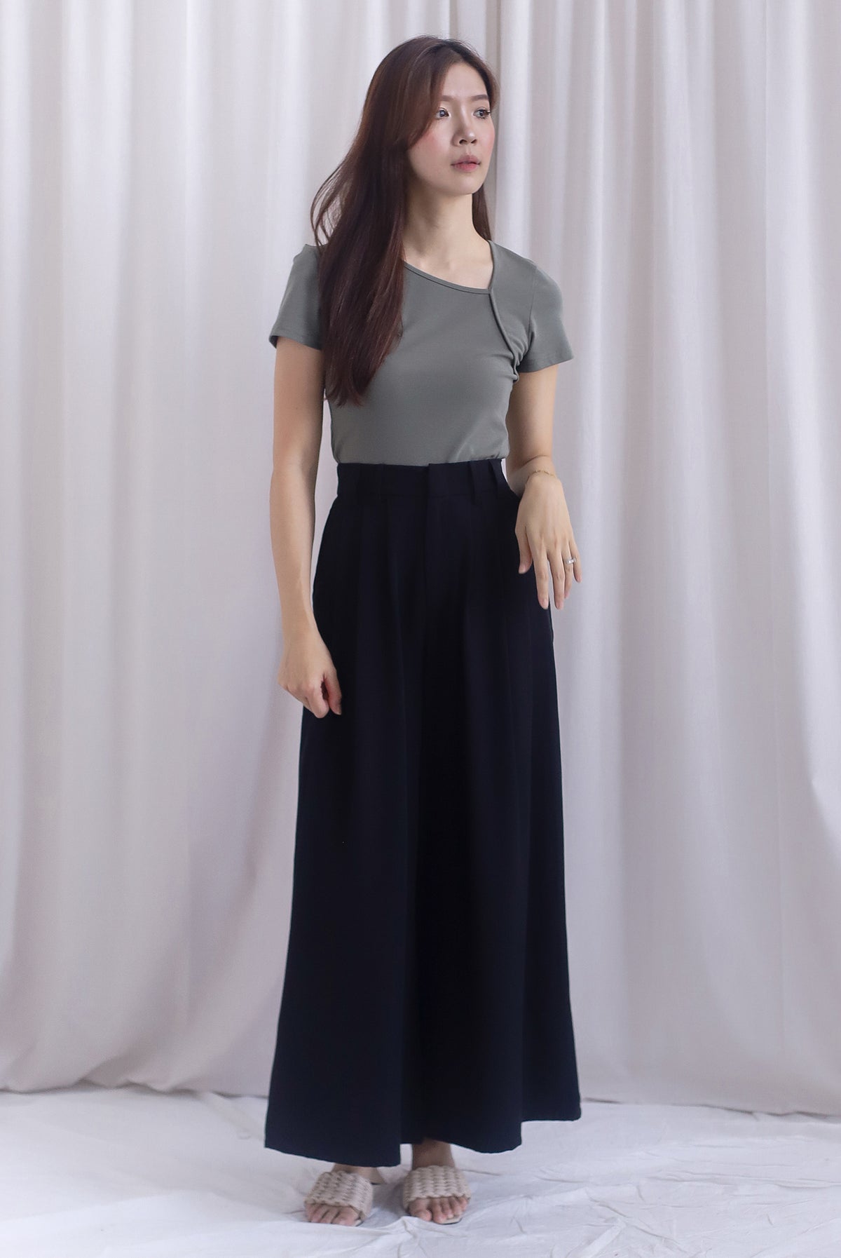 Jevon Wide Legged Pleated Palazzo Pants In Black
