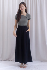 Jevon Wide Legged Pleated Palazzo Pants In Black