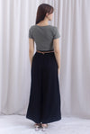 Jevon Wide Legged Pleated Palazzo Pants In Black