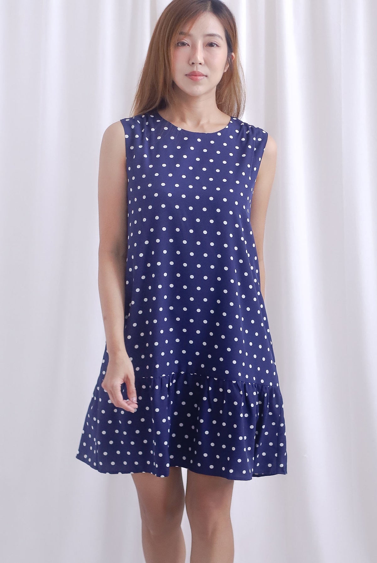 Kara Babydoll Drop Hem Dress In Navy Polkadot