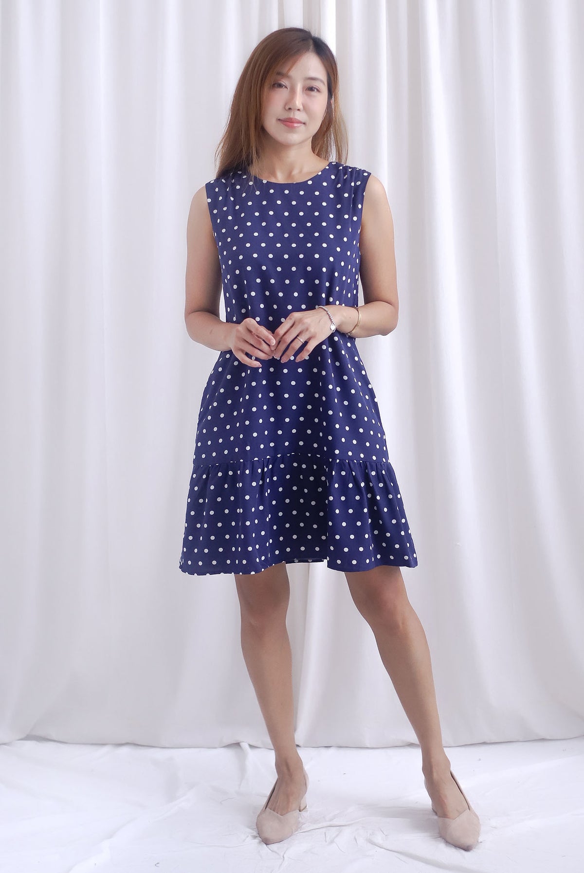 Kara Babydoll Drop Hem Dress In Navy Polkadot