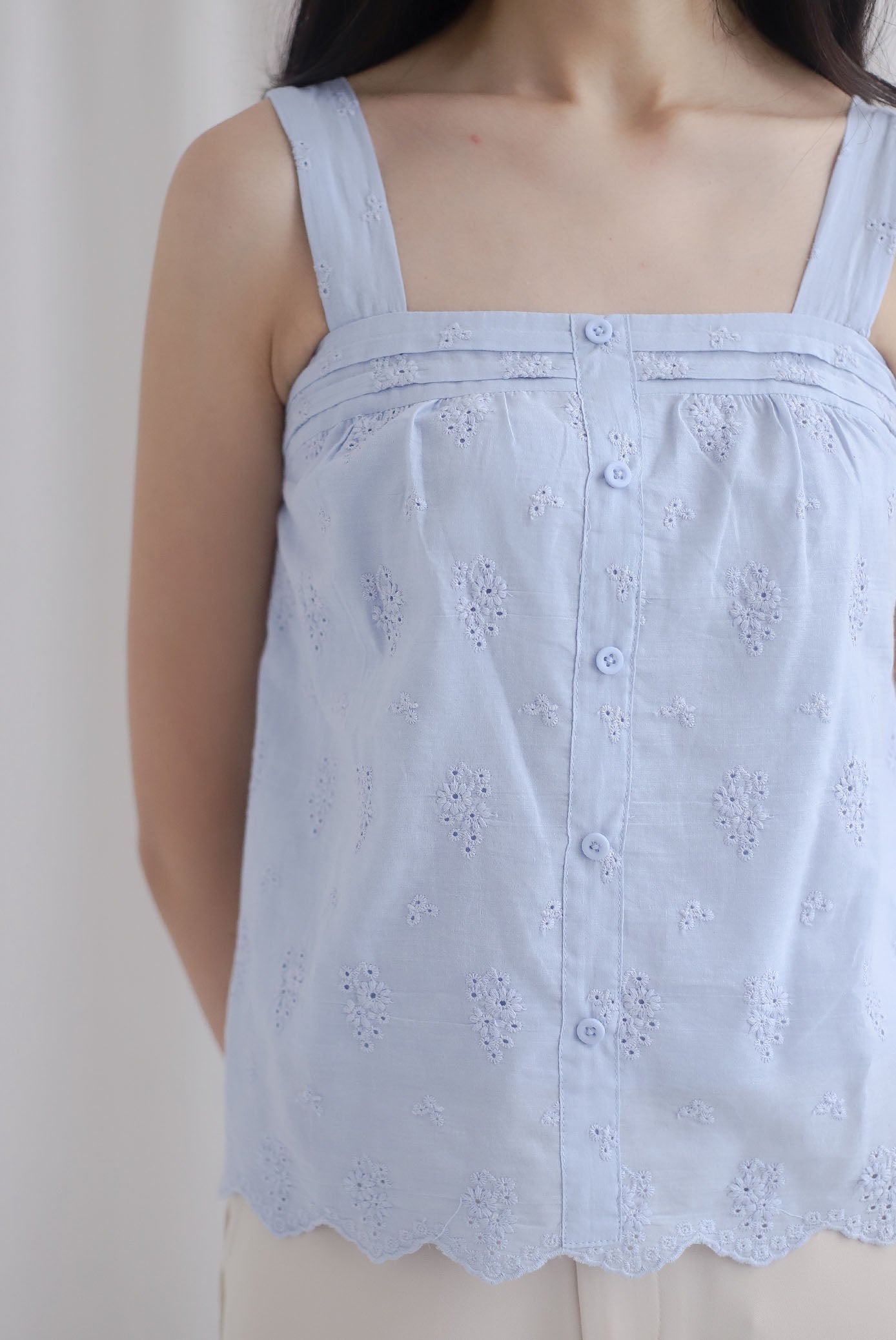 Kristy Pintuck Buttons Eyelet Top In Blue