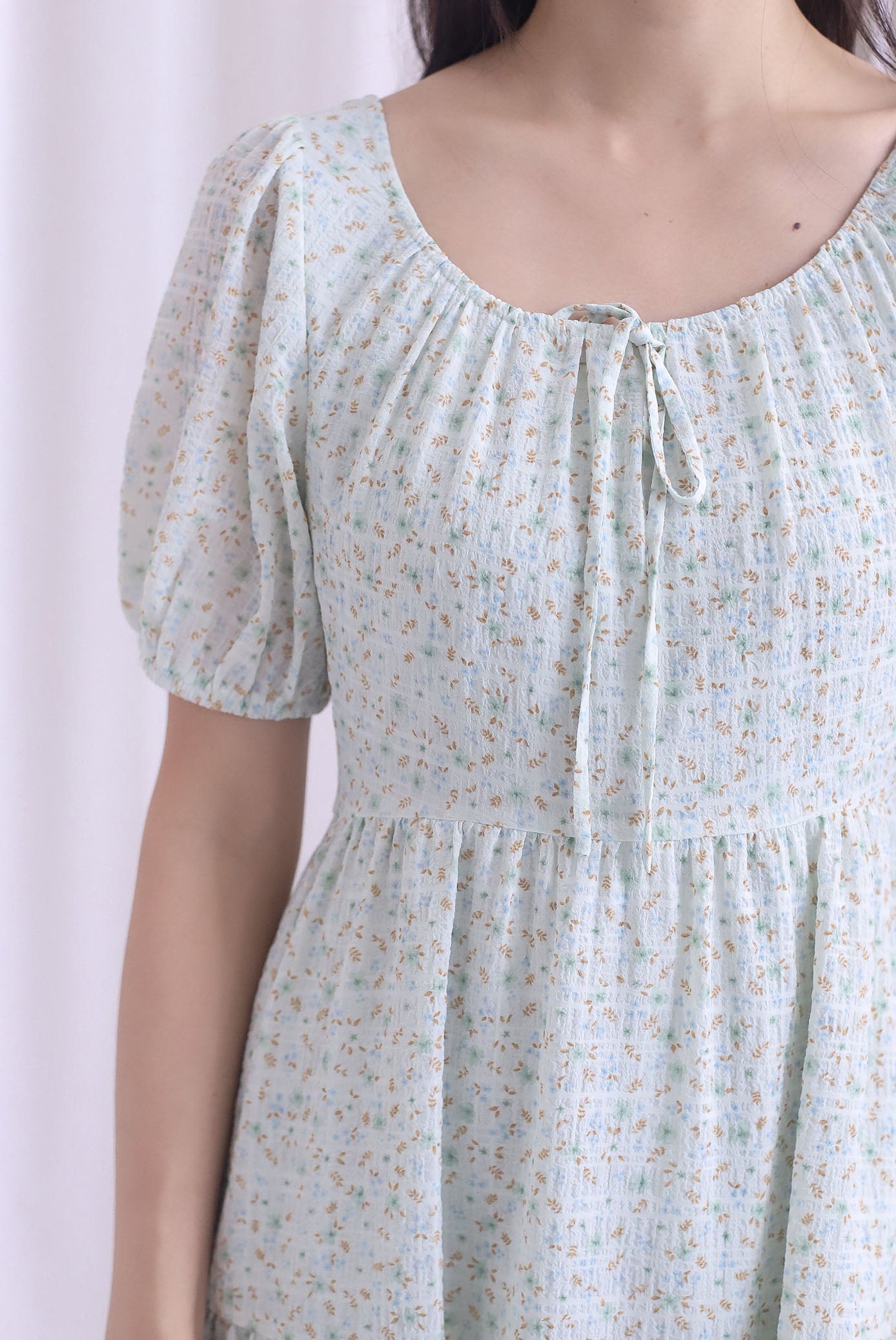 Lynn Floral Texture Tie Puffy Romper Dress In Green