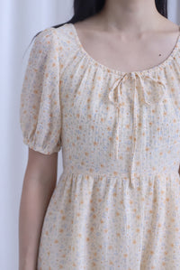 Lynn Floral Texture Tie Puffy Romper Dress In Pale Orange