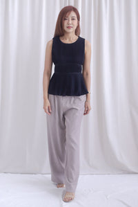 Meret Pleated Peplum Top In Black