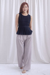 Meret Pleated Peplum Top In Black