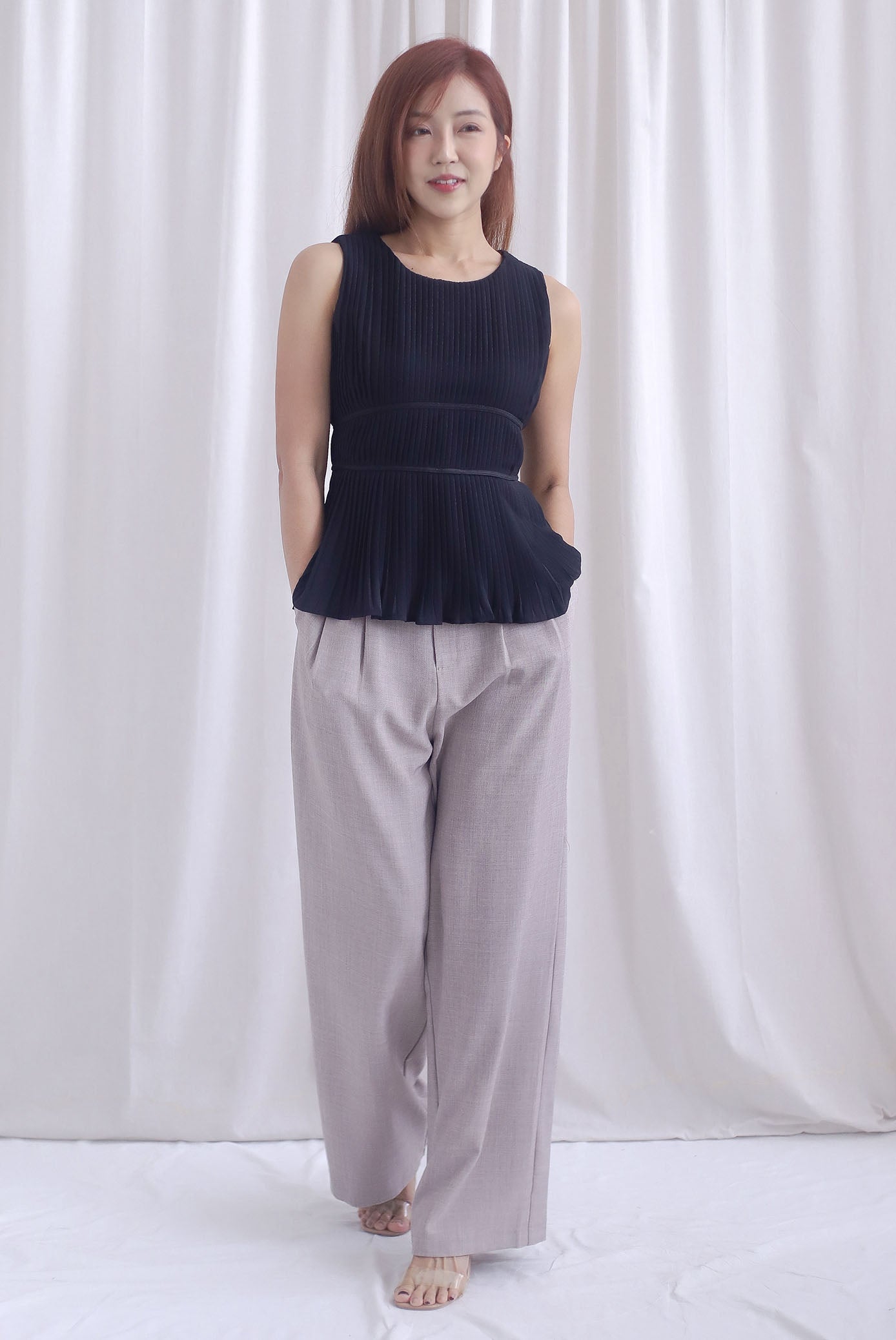 Meret Pleated Peplum Top In Black