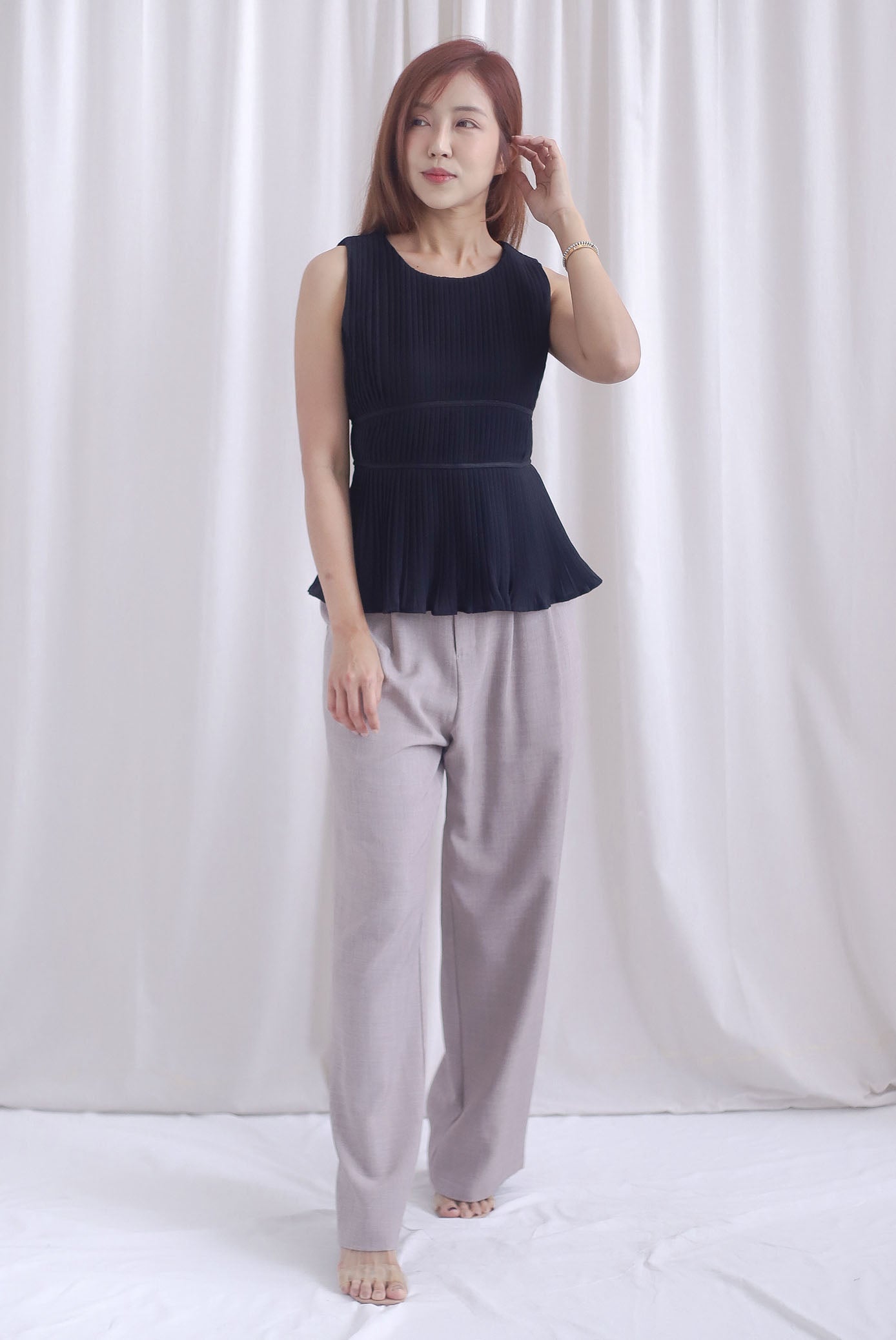 Meret Pleated Peplum Top In Black