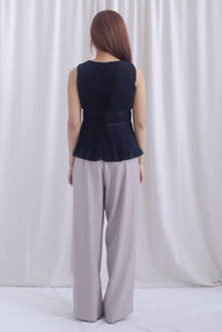 Meret Pleated Peplum Top In Black