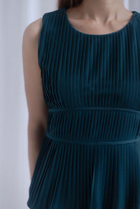 Meret Pleated Peplum Top In Forest Green