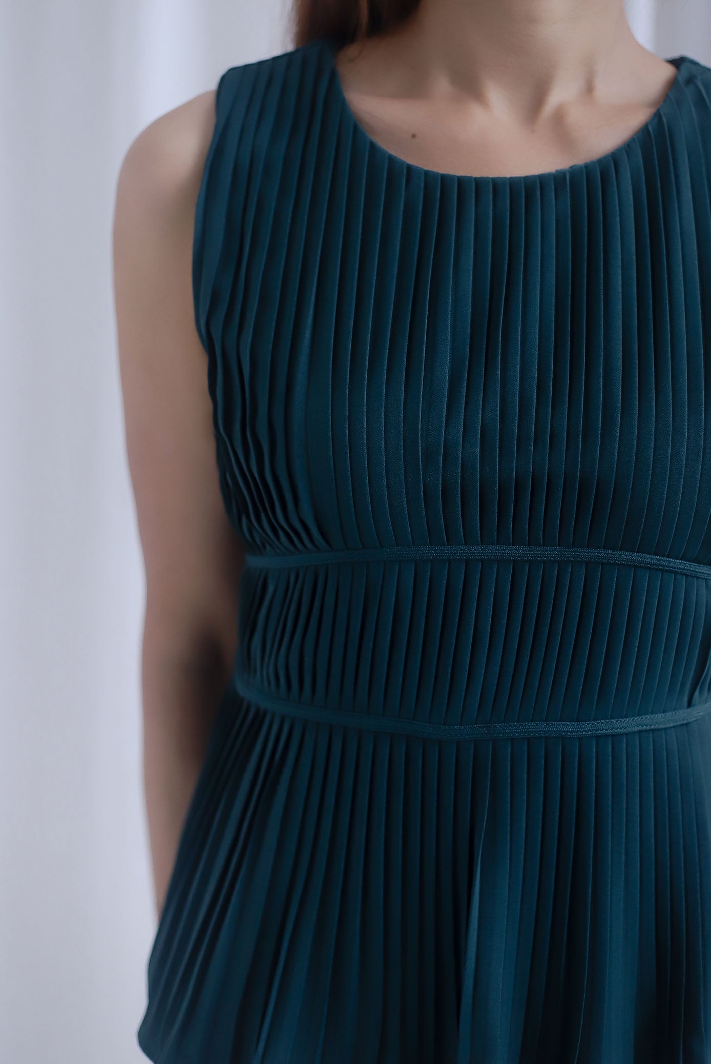 Meret Pleated Peplum Top In Forest Green