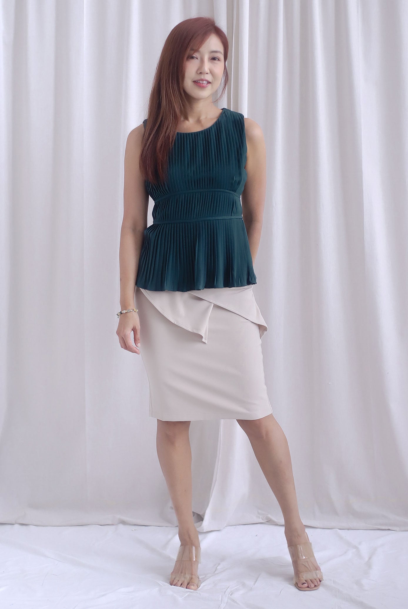 Meret Pleated Peplum Top In Forest Green