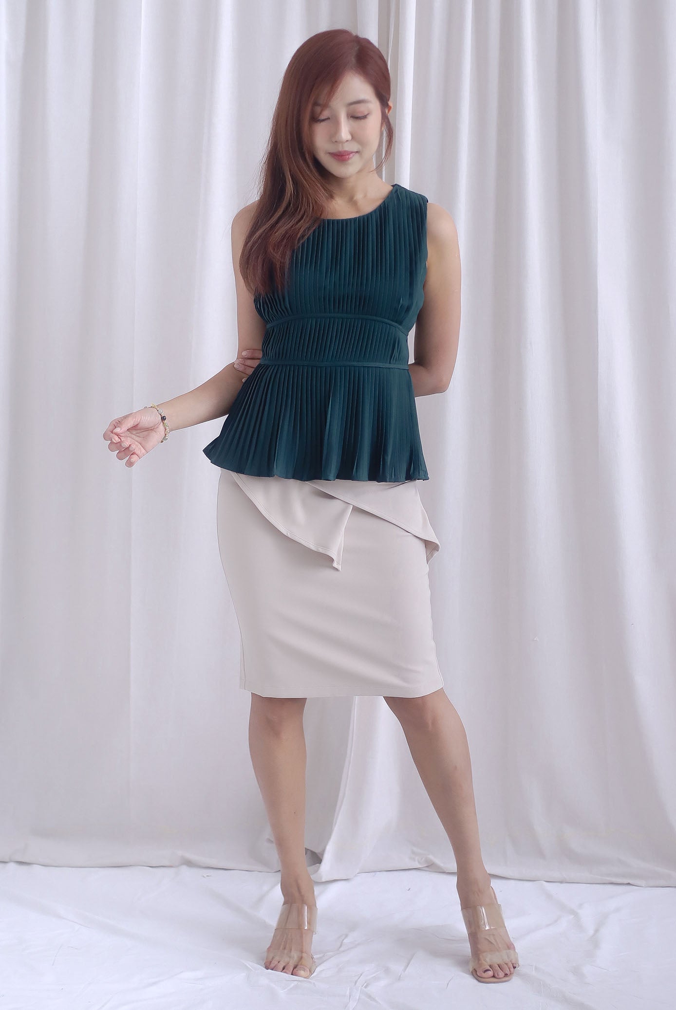 Meret Pleated Peplum Top In Forest Green