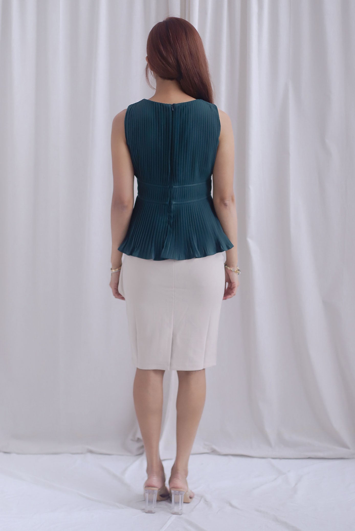 Meret Pleated Peplum Top In Forest Green