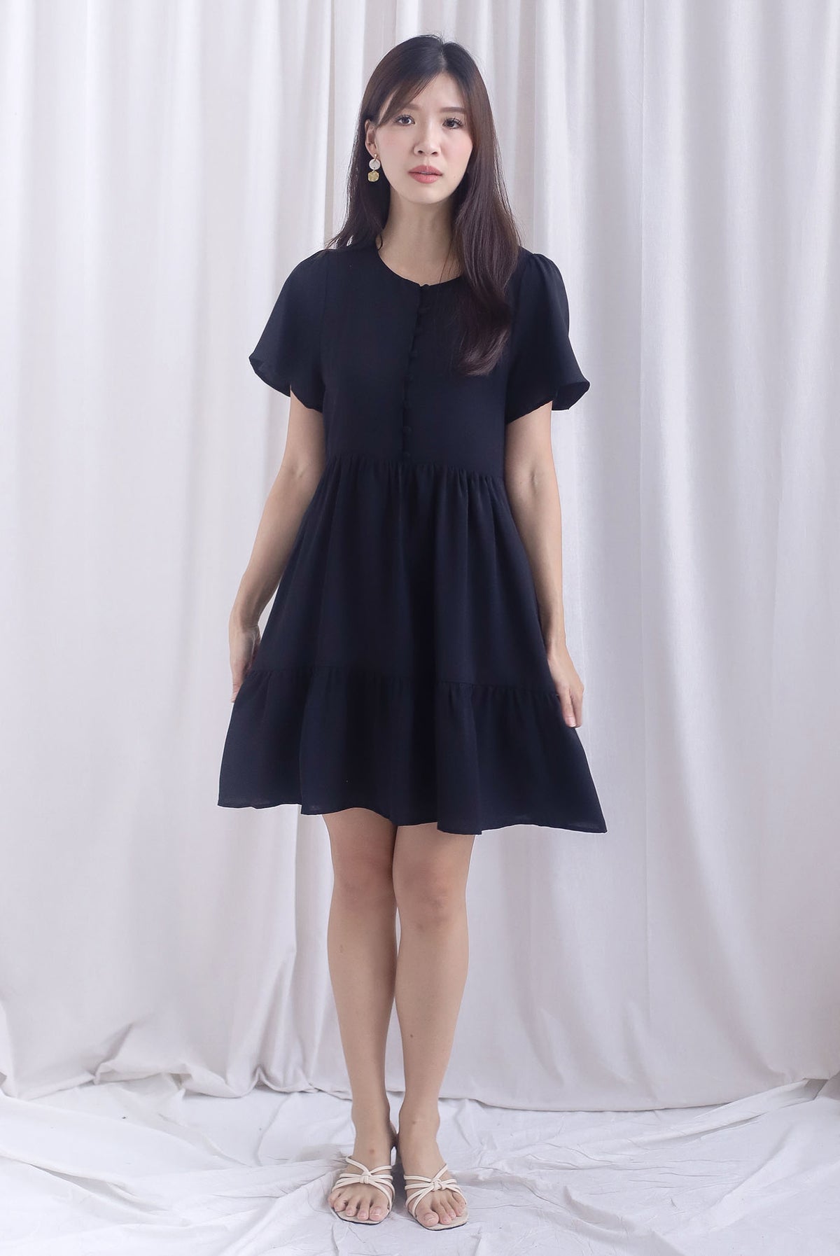 Oralie Flutter Sleeve Buttons Babydoll Dress In Black