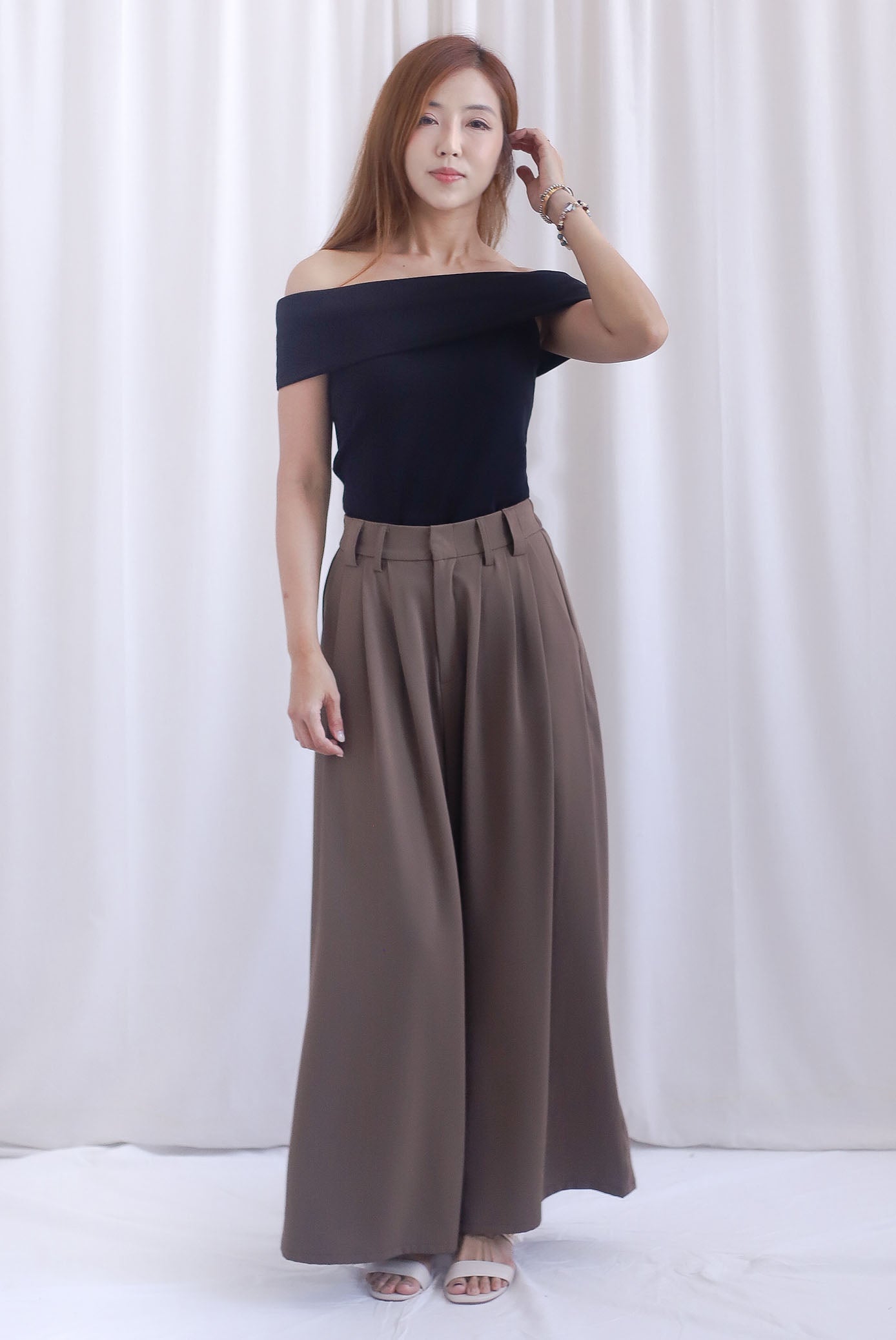 Jevon Wide Legged Pleated Palazzo Pants In Mocha