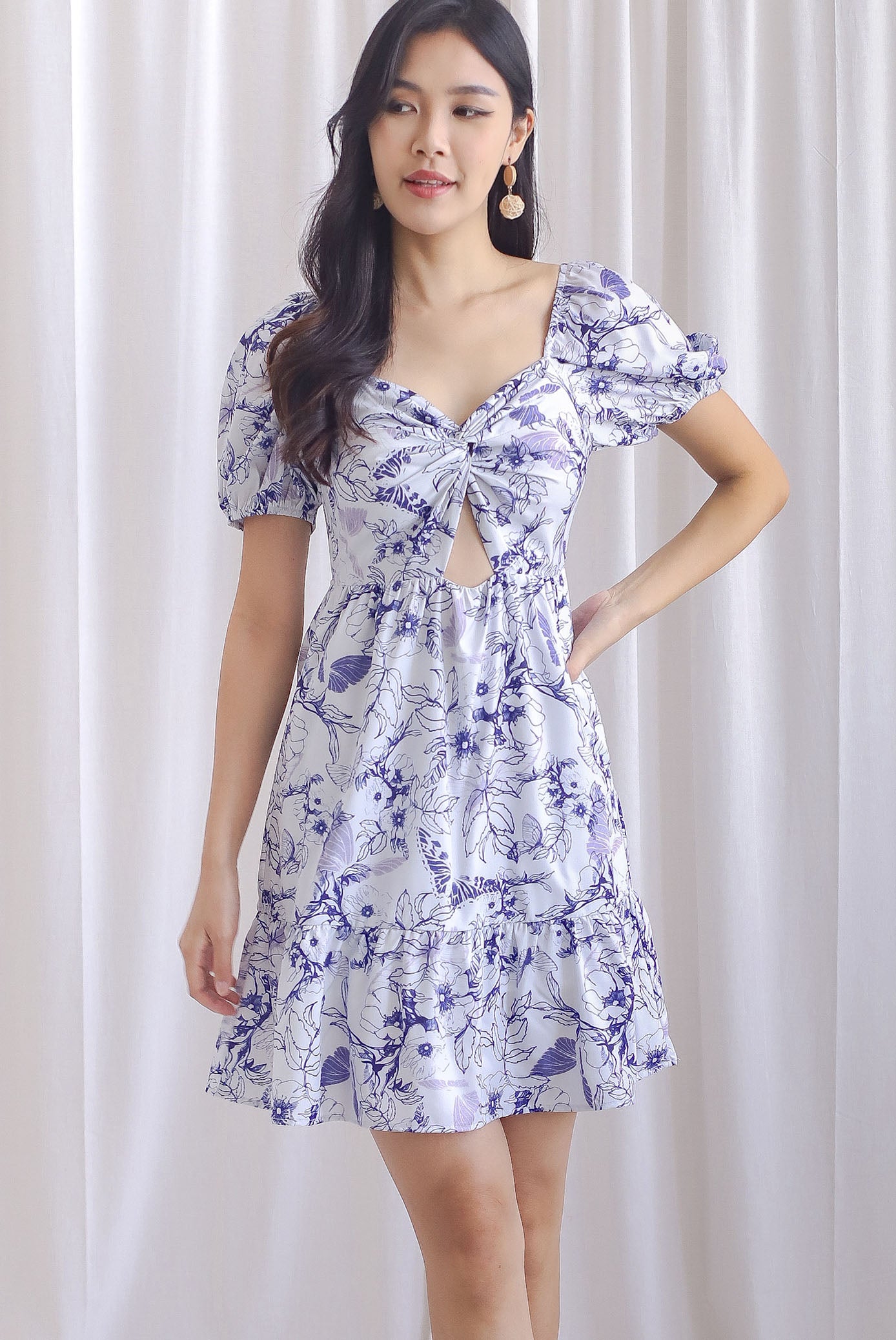 Tiffany Twist Knot Cut Out Romper Dress In Purple Floral The Design Closets Tiffany Twist Knot Cut Out Romper Dress In Purple Floral The Design Closets