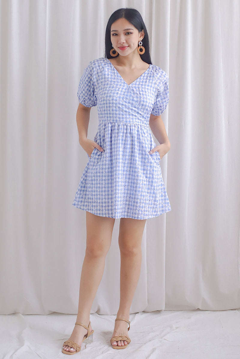 Evvie Gingham Embro Faux Wrap Romper In Blue