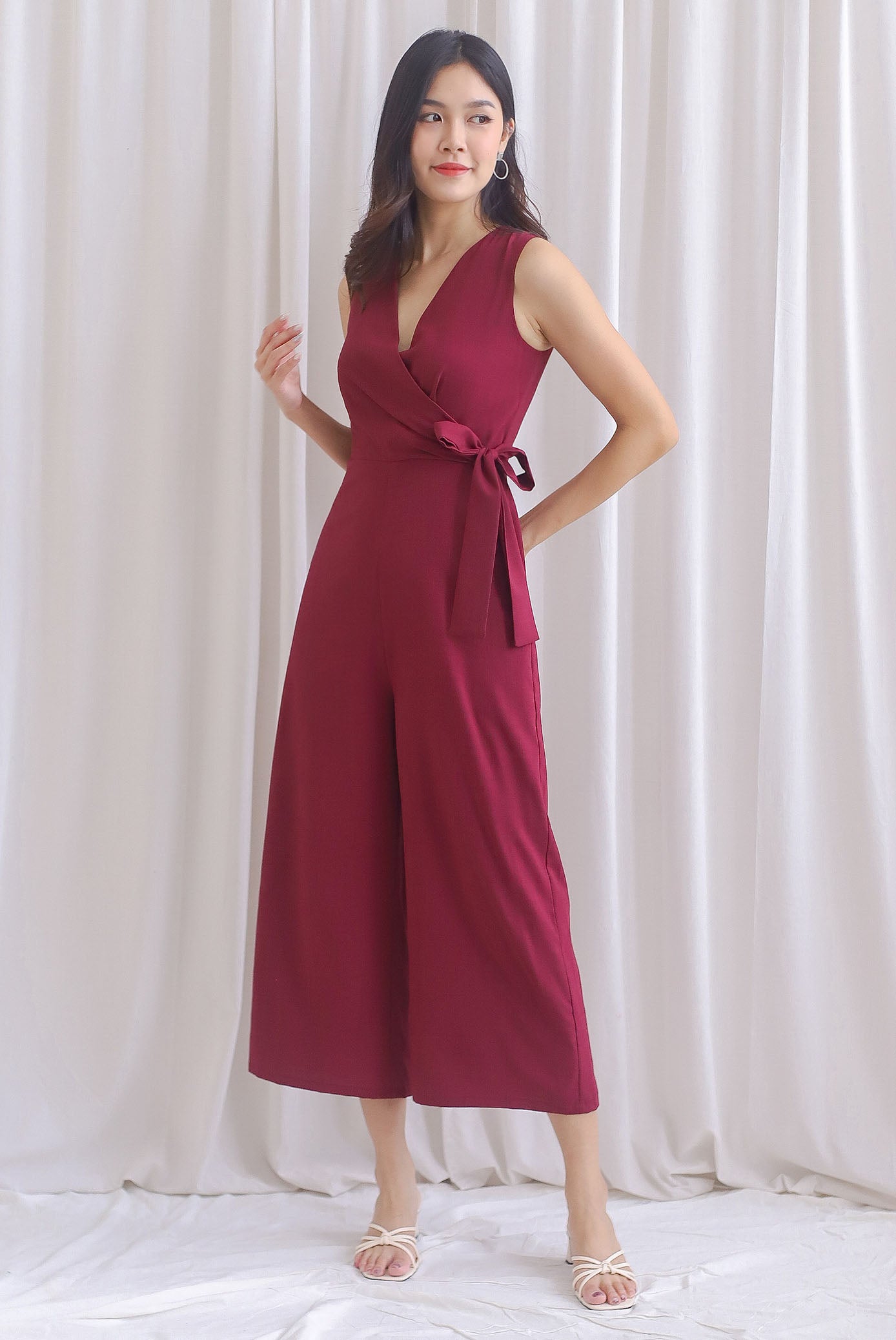 Ivy Faux Wrap Tie Jumpsuit In Wine Red