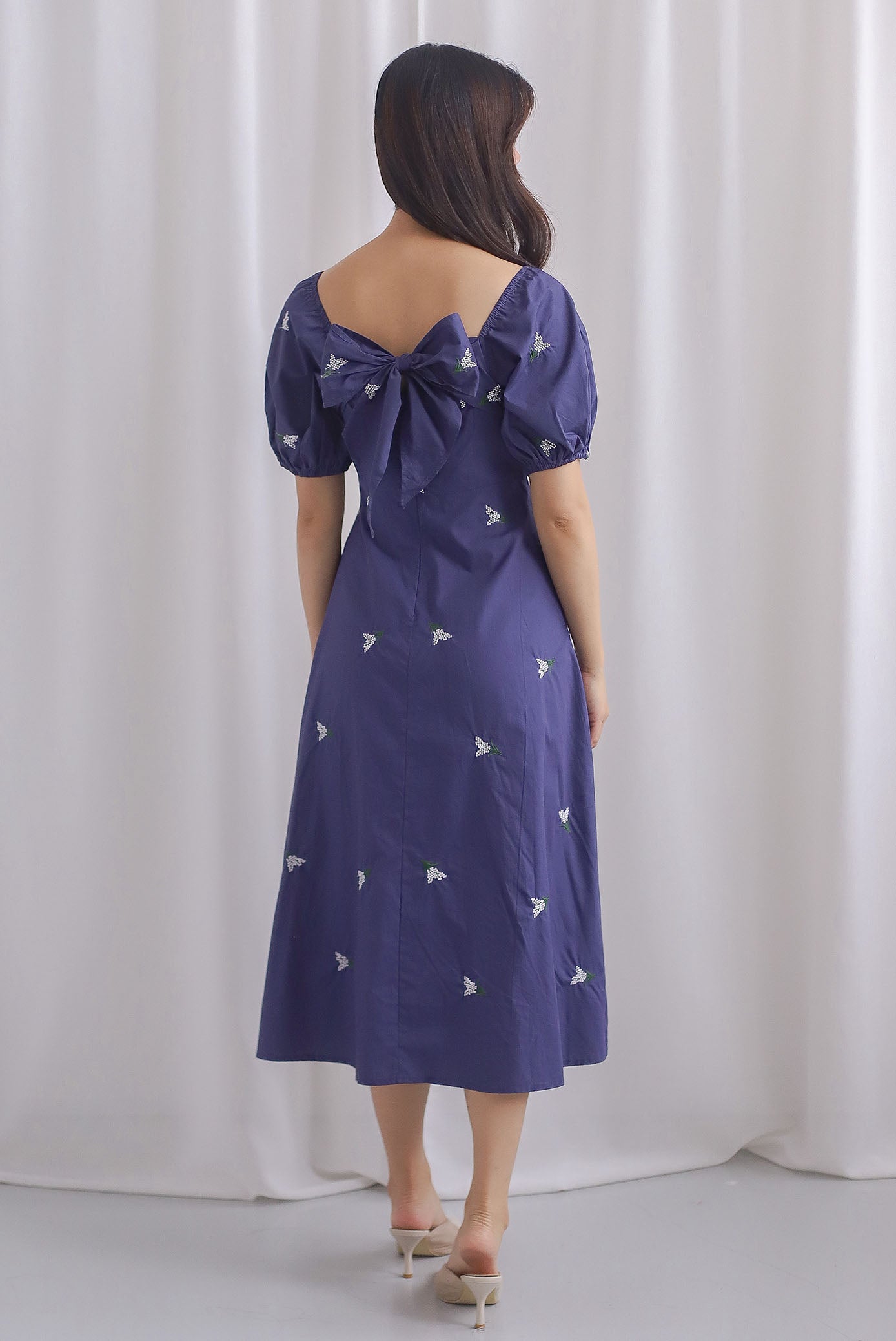 Meryl Embroidery Bow Back Dress In Navy Blue
