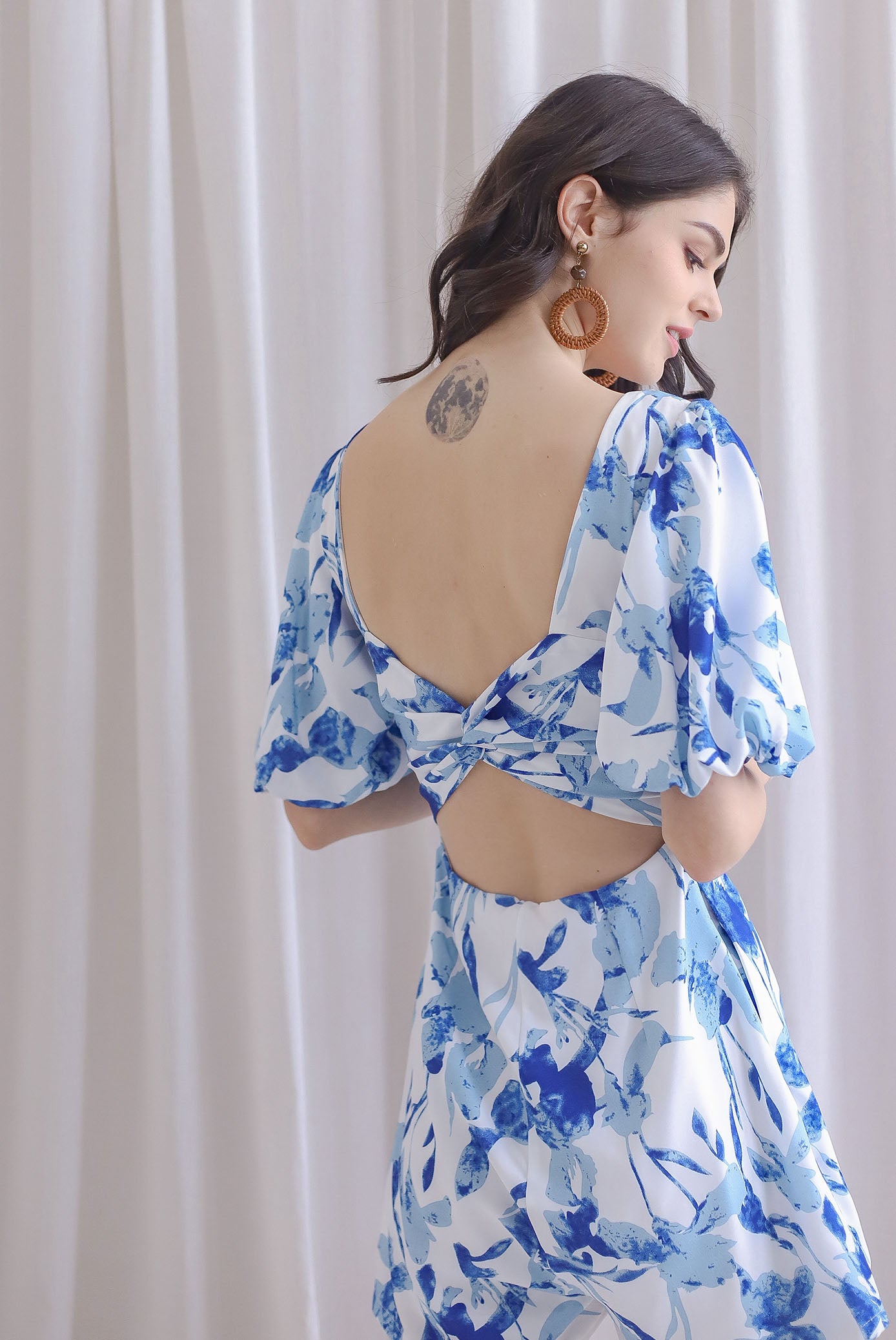 Poppie Puffy Sleeve Bow Back Romper In Blue Floral