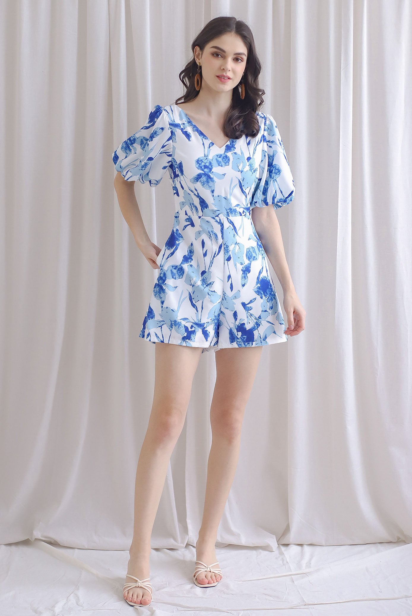 Poppie Puffy Sleeve Bow Back Romper In Blue Floral