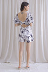 Poppie Puffy Sleeve Bow Back Romper In Mono Floral